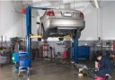 Professional vehicle lifting equipment at Collision King Repair Center, located at Lubbock, TX, 79424, allows our damage estimators a clear view of all collision related damages.