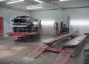 Professional vehicle lifting equipment at Professional Paint & Body Inc., located at Alabaster, AL, 35007, allows our damage estimators a clear view of all collision related damages.