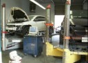 Professional vehicle lifting equipment at Clinton Auto Body, located at Clinton, MD, 20735, allows our damage estimators a clear view of all collision related damages.