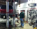 Professional vehicle lifting equipment at South Hill Collision, located at Puyallup, WA, 98375-6621, allows our damage estimators a clear view of all collision related damages.