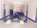 Professional vehicle lifting equipment at Car Guys Collision Repair - Lady Lake North, located at Lady Lake, FL, 32159, allows our damage estimators a clear view of all collision related damages.