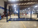 Professional vehicle lifting equipment at Car Guys Collision Repair Ocala East, located at Ocala, FL, 34471, allows our damage estimators a clear view of all collision related damages.