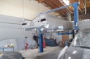 Professional vehicle lifting equipment at West Coast Collision Center, located at Riverside, CA, 92509, allows our damage estimators a clear view of all collision related damages.