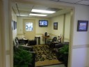 The waiting area at our body shop, located at Huntsville, AL, 35816 is a comfortable and inviting place for our guests.