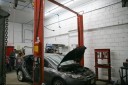 Professional vehicle lifting equipment at Modern Auto Body - South Orange, located at South Orange, NJ, 07079, allows our damage estimators a clear view of all collision related damages.