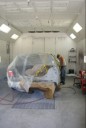 A clean and neat refinishing preparation area allows for a professional job to be done at Gross & Son Paint & Body Shop, Inc., Pensacola, FL, 32505.