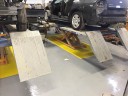 Professional vehicle lifting equipment at Moppert Auto Collision Corporate, located at Turnersville, NJ, 08012, allows our damage estimators a clear view of all collision related damages.