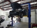 Professional vehicle lifting equipment at Northglenn Auto Body, located at Denver, CO, 80234, allows our damage technicians a clear view of what might be causing the problem.