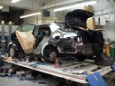 Professional vehicle lifting equipment at Spina & Adams Collision Services, located at Upper Darby, PA, 19082, allows our damage estimators a clear view of all collision related damages.