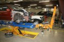 Professional vehicle lifting equipment at AutoBody Express - Longview, located at Longview, TX, 75605, allows our damage estimators a clear view of all collision related damages.