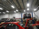 Professional vehicle lifting equipment at A & B Collision - Veterans Road West, located at Staten Island, NY, 10309, allows our damage estimators a clear view of all collision related damages.