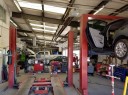 Professional vehicle lifting equipment at Danlar Group, located at Albuquerque, NM, 87102, allows our damage technicians a clear view of what might be causing the problem.