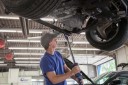 Professional vehicle lifting equipment at American Auto Body - Brooklyn Park, located at Brooklyn Park, MN, 55445, allows our damage estimators a clear view of all collision related damages.